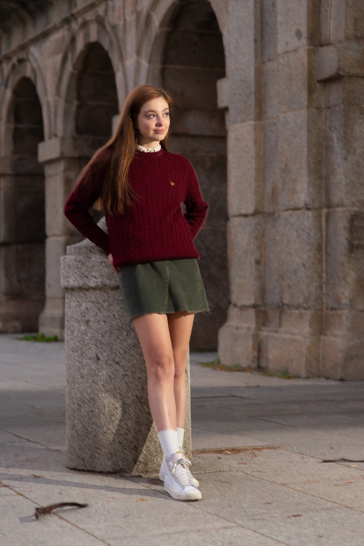 Cable knit sweater with heathered lining at the neck