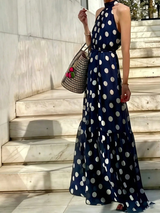 Long navy blue polka dot dress with apron neck