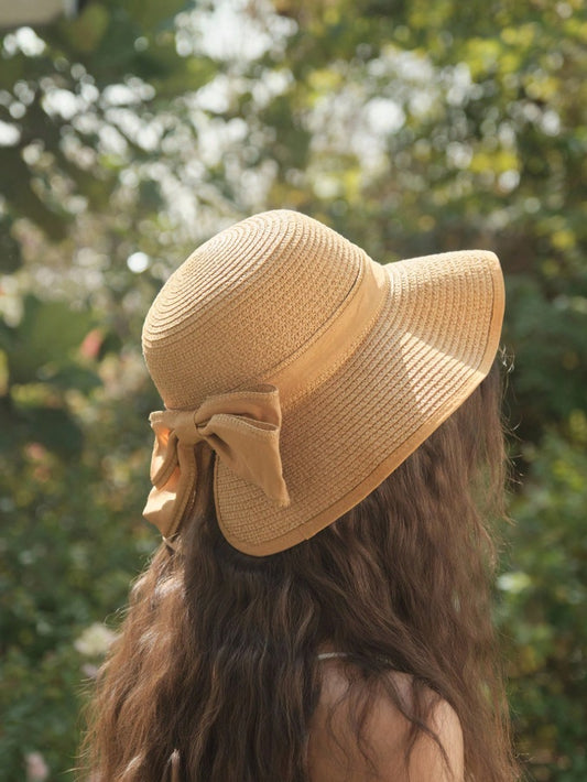 Raffia hat with bow and petal shape