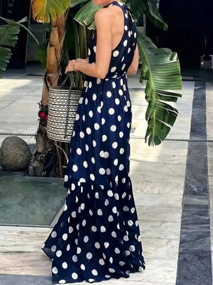 Long navy blue polka dot dress with apron neck