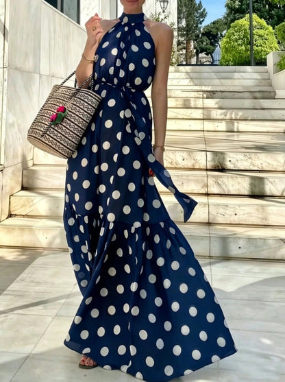 Long navy blue polka dot dress with apron neck